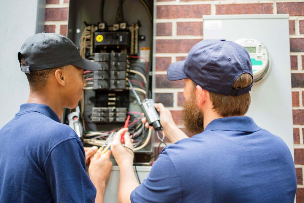 electricians determining if New Electric Panel Install is needed